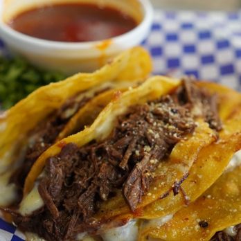 Taqueria La Perla Tapatia signature dishes Street TacoPina Nieto TacosSuper QuesadillaSuper Burrito